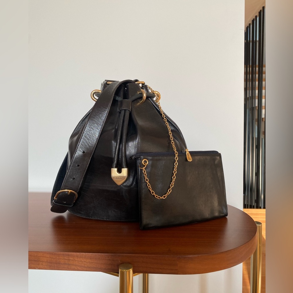 Bally Black Leather Bucket Bag with Bold Gold Hardware and Attached Pouch